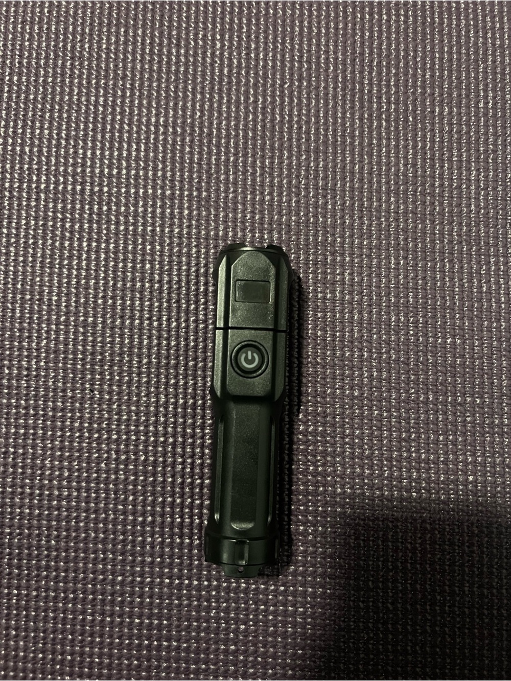 Compact Black LED Flashlight with Single-Button Control - Picture 4 of 5